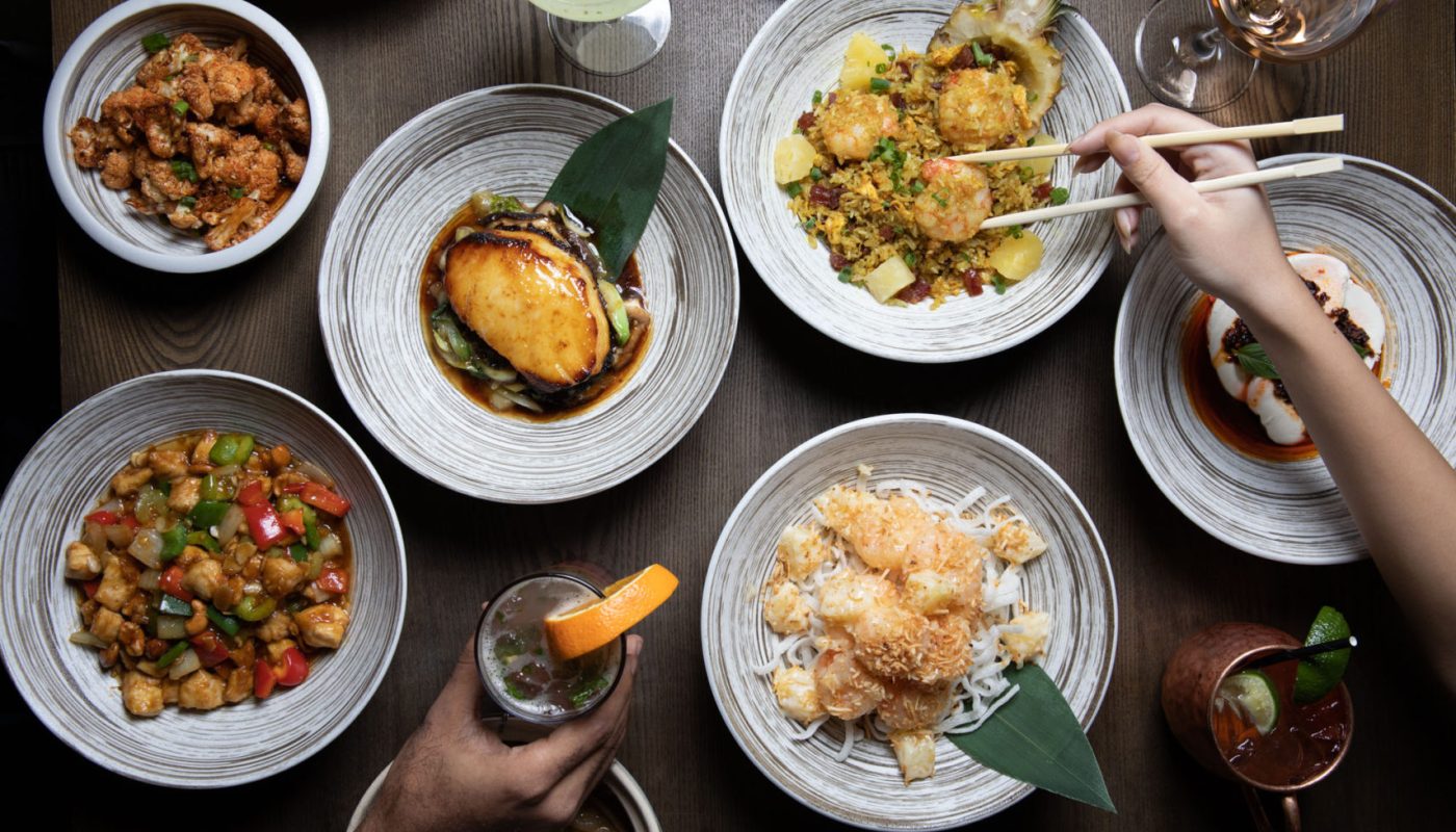 Dining Table from Above set with delicious Chinese food from Roly